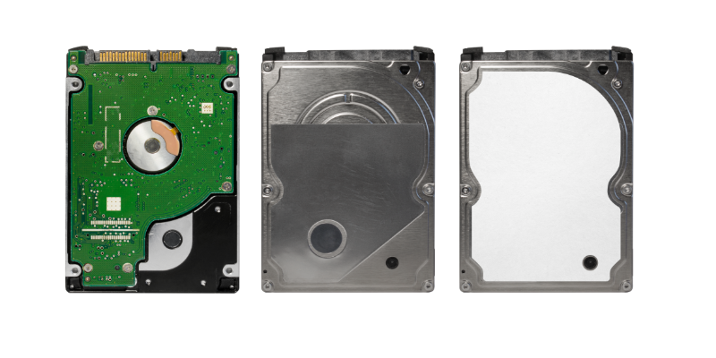 Hard disk drive components showing the circuit board, internal platter cover and drive casing